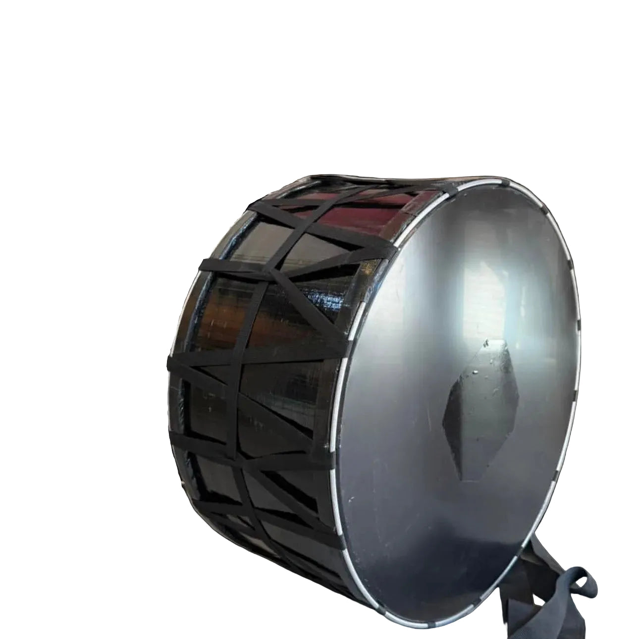 Marching bass drum with a black carrying strap on a transparent background